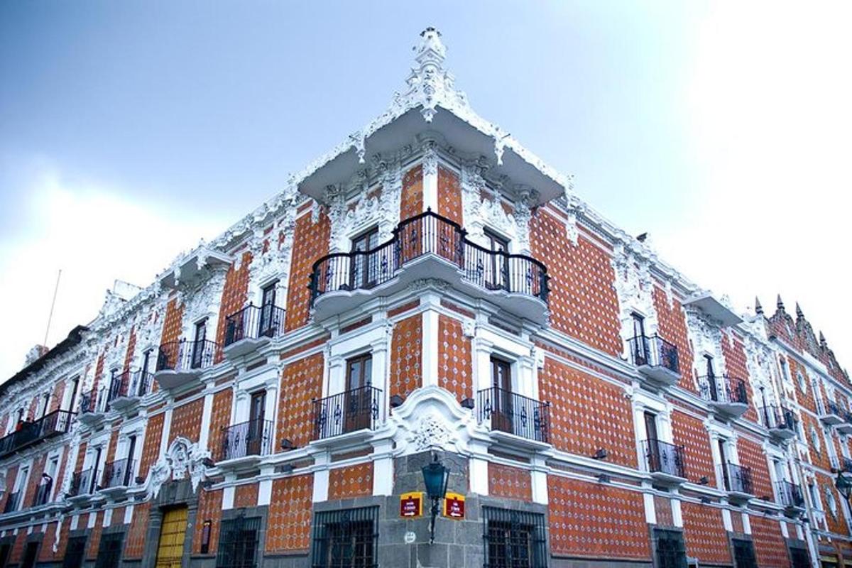 a large red brick building with a clock on it