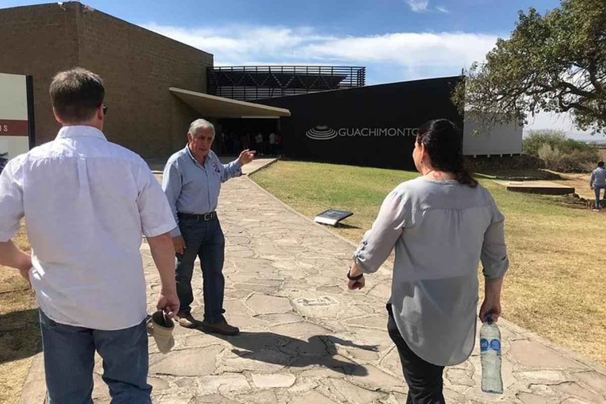 a group of people standing in front of a building
