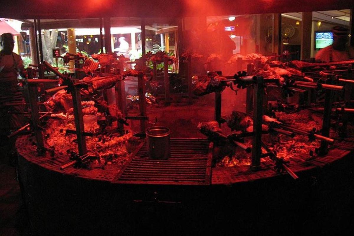 a group of chickens on a stage in a restaurant