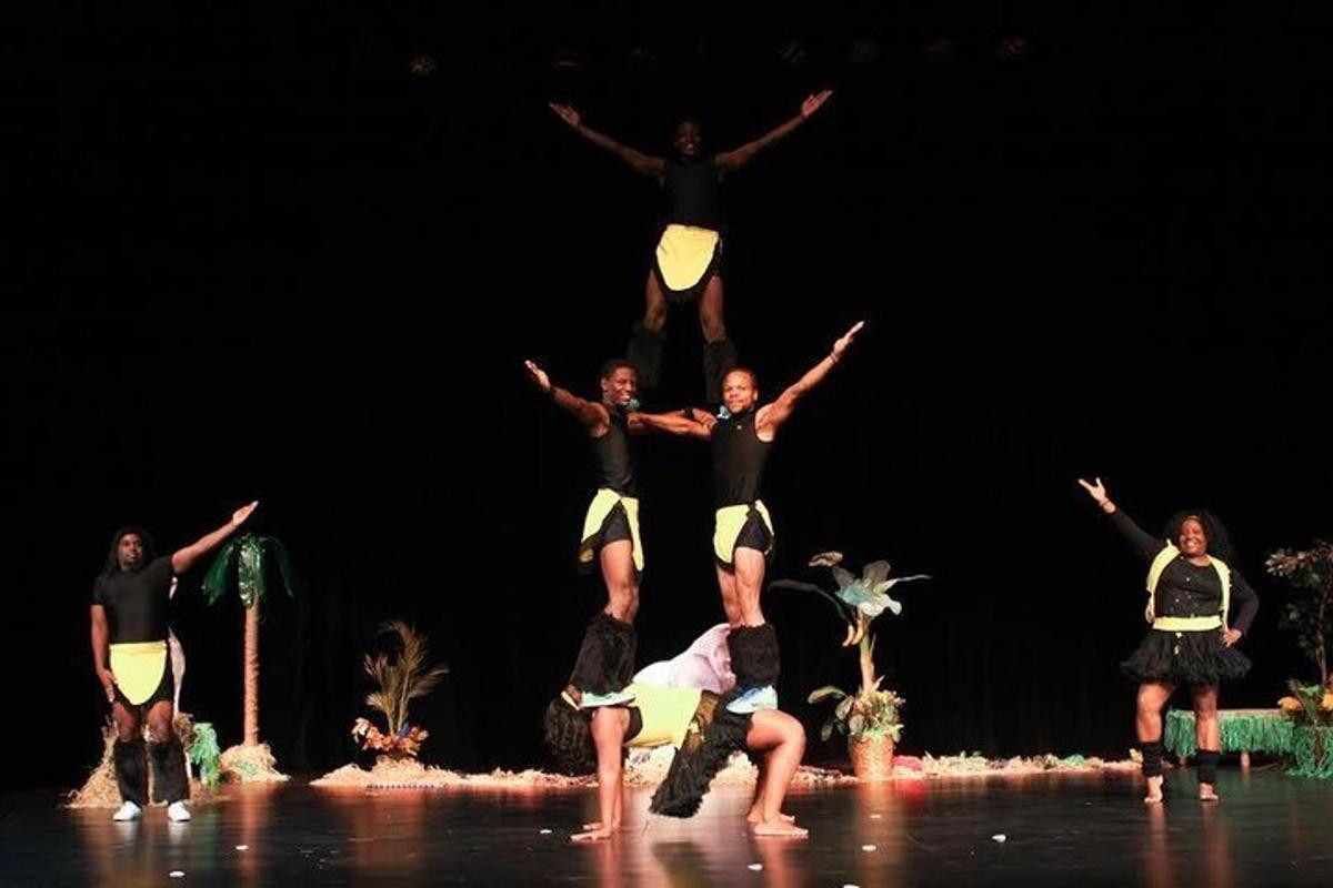 a group of performers performing on a stage