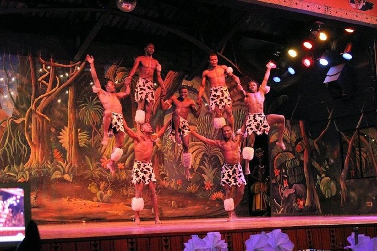 a group of dancers performing on a stage