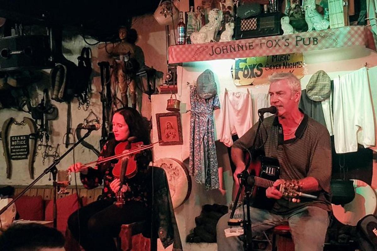 a man and a woman playing instruments in a room