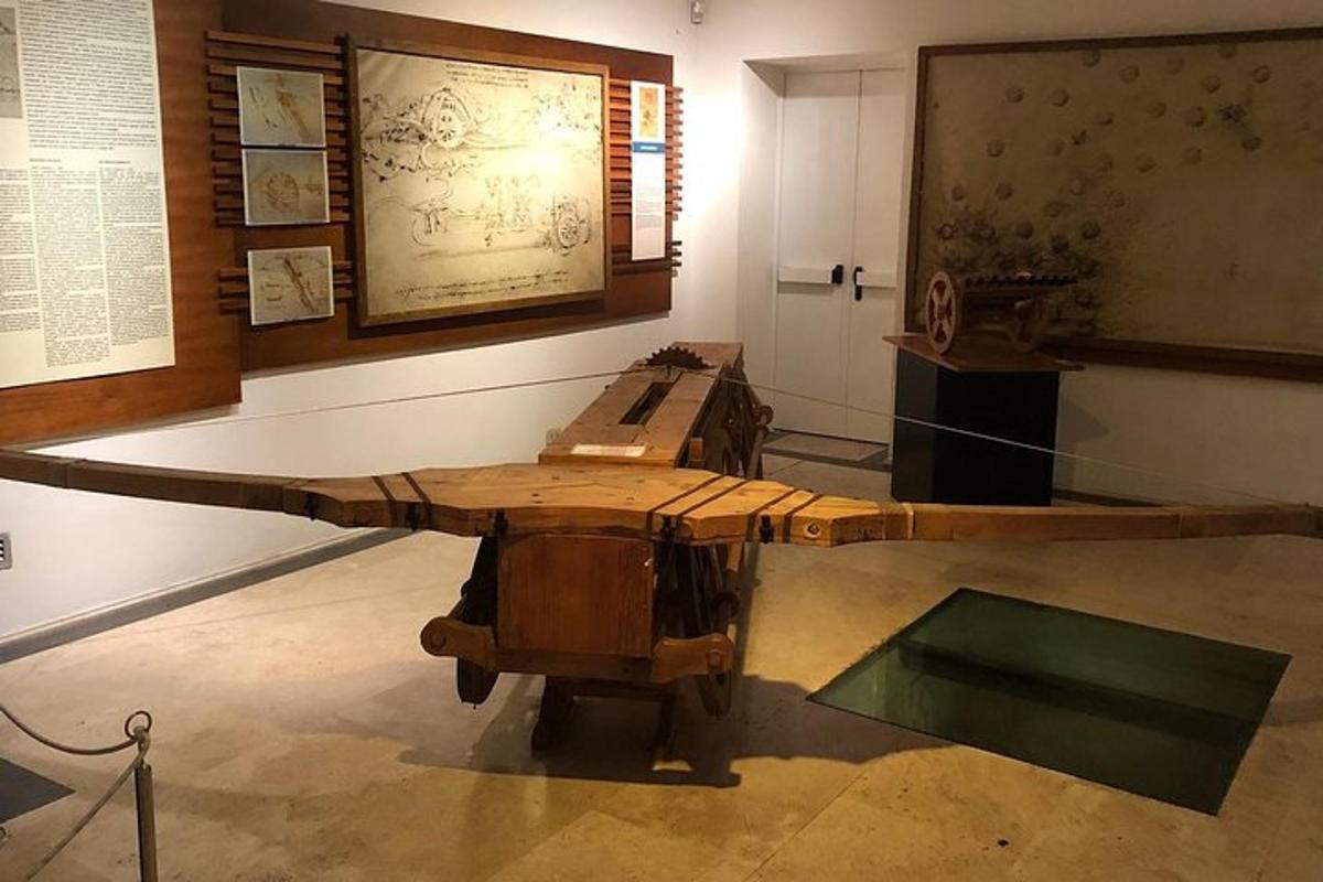 a museum exhibit with a wooden table in a room