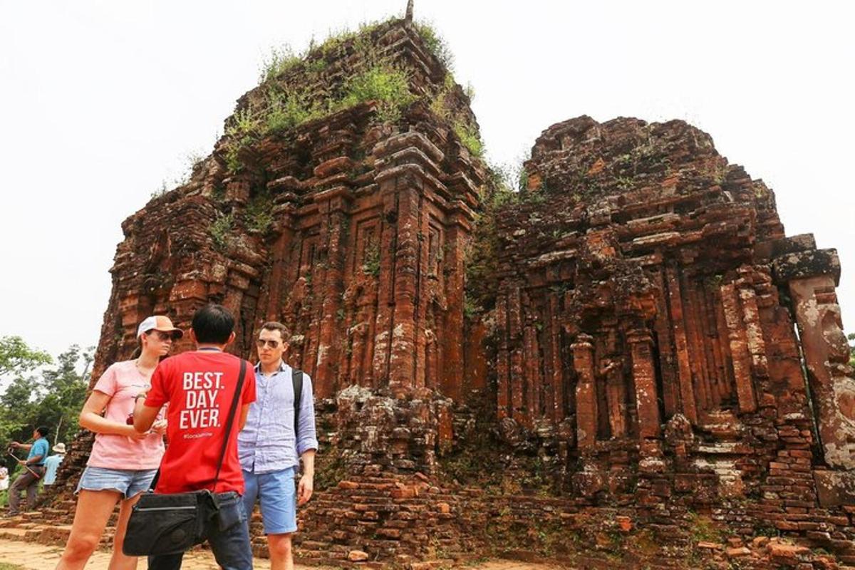 a group of people standing in front of a temple