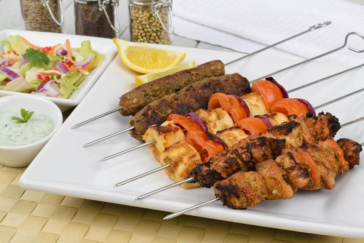 a plate of food with meat and vegetables on a table