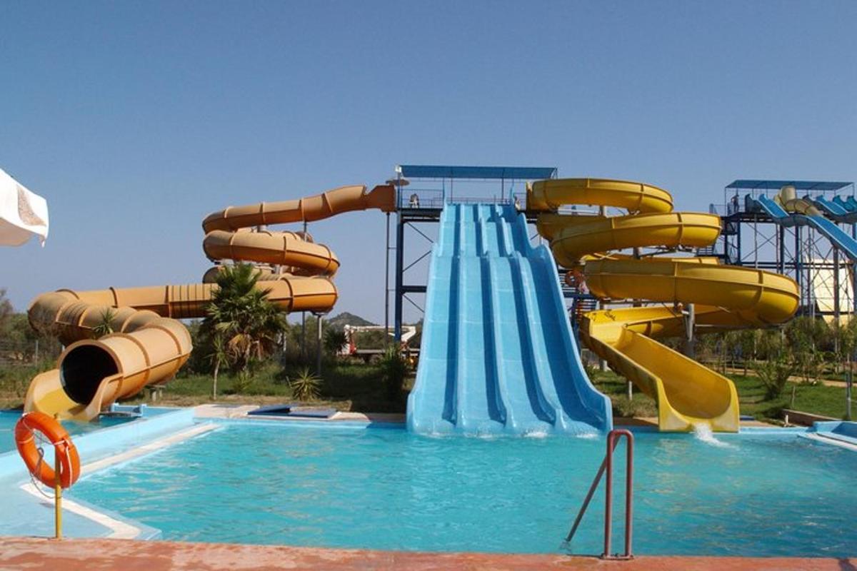 a water slide in a swimming pool in a resort