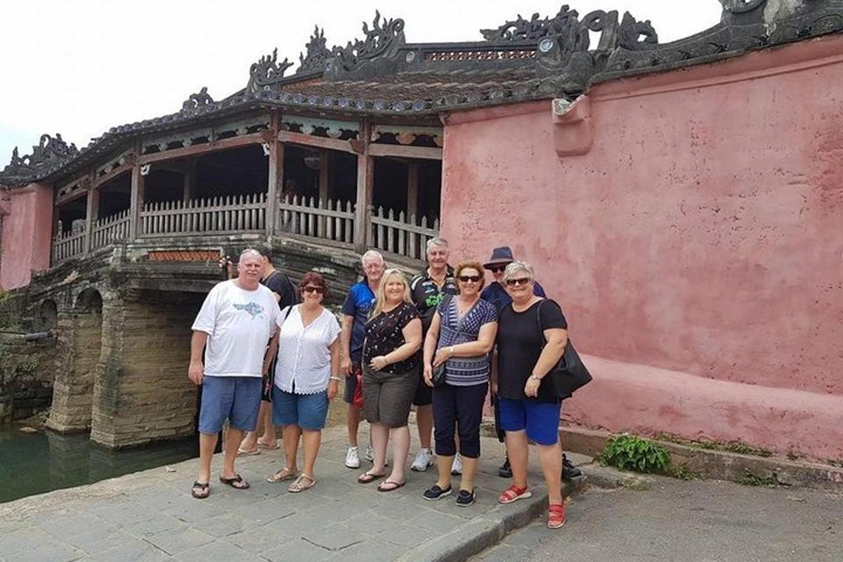 a group of people standing in front of a building