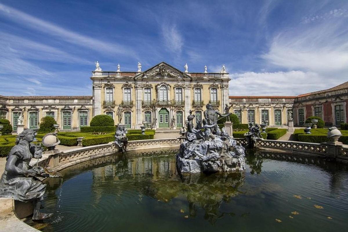 a building with a fountain in front of a building