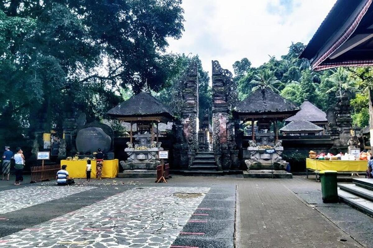a stone walkway in front of a temple