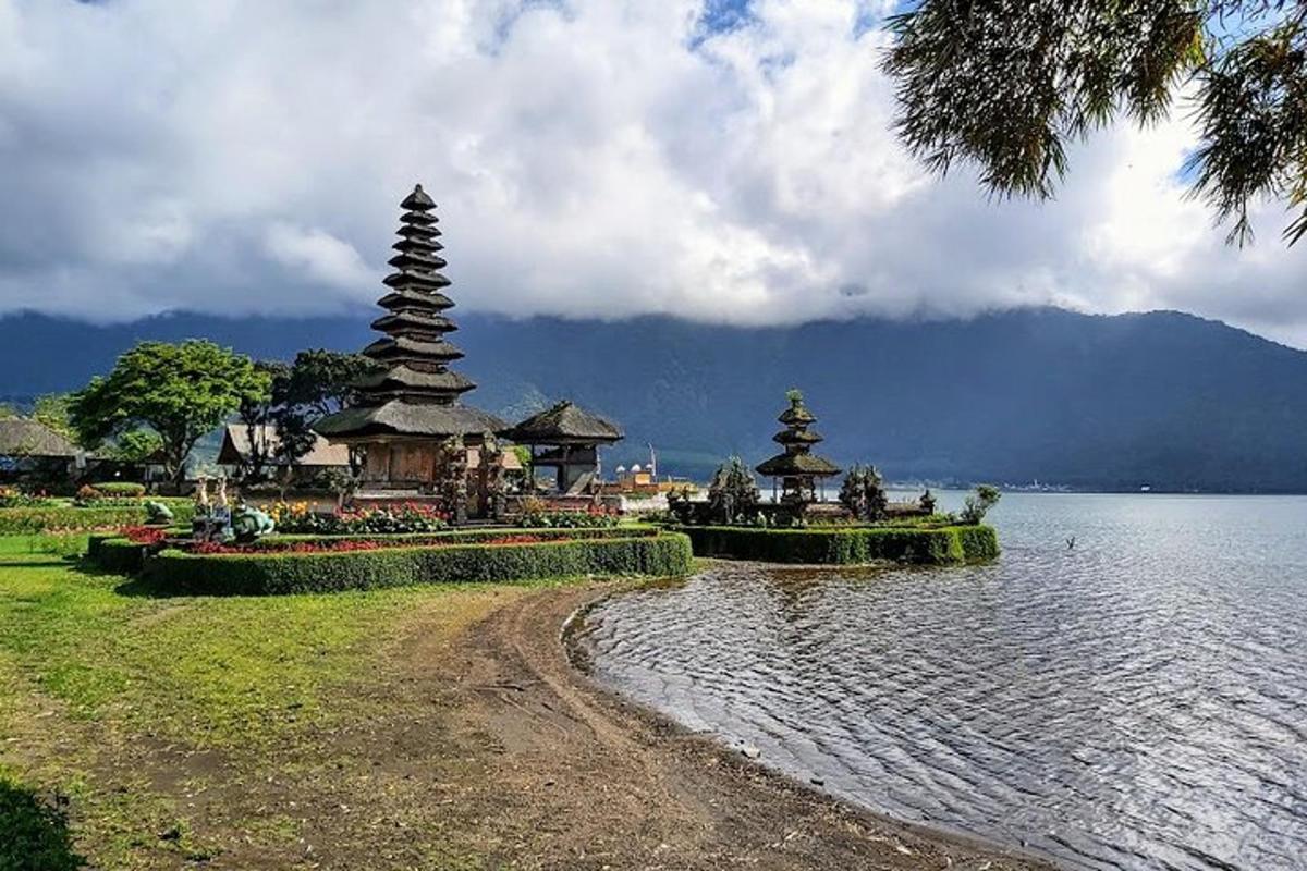 a lake with two pagodas in the middle