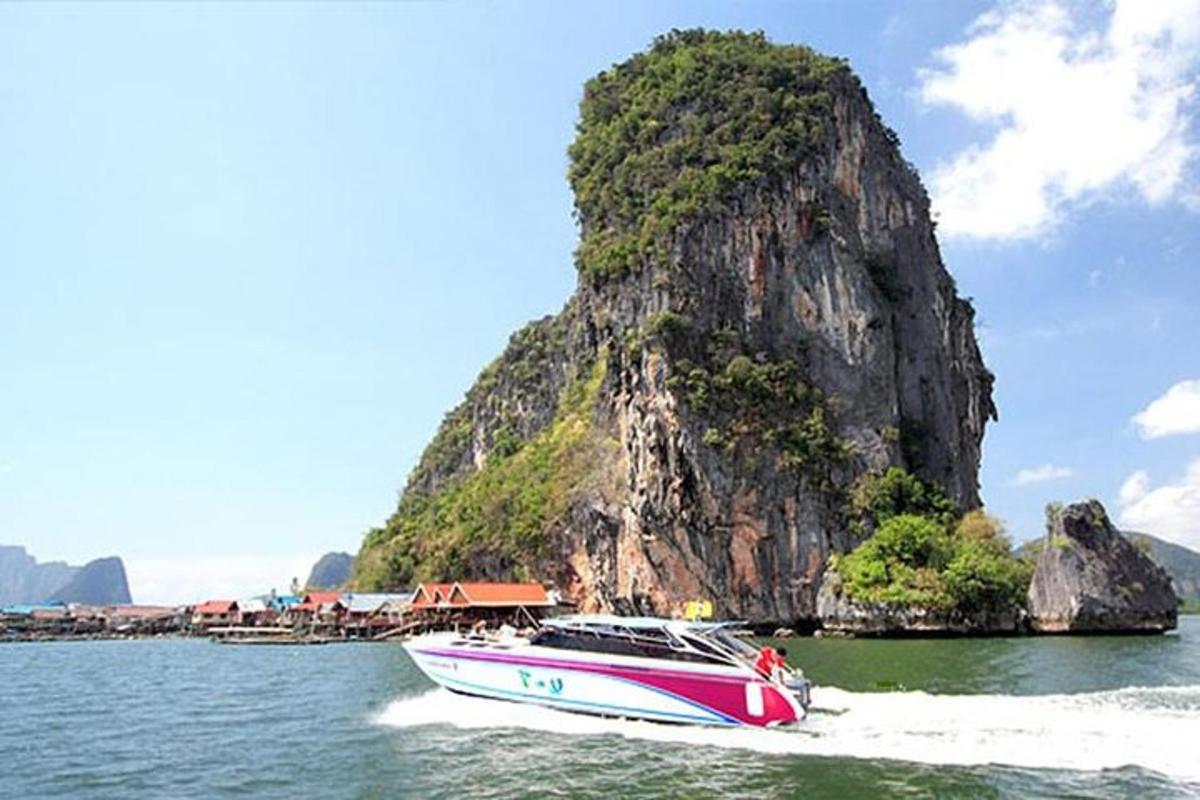 a boat in the water in front of an island