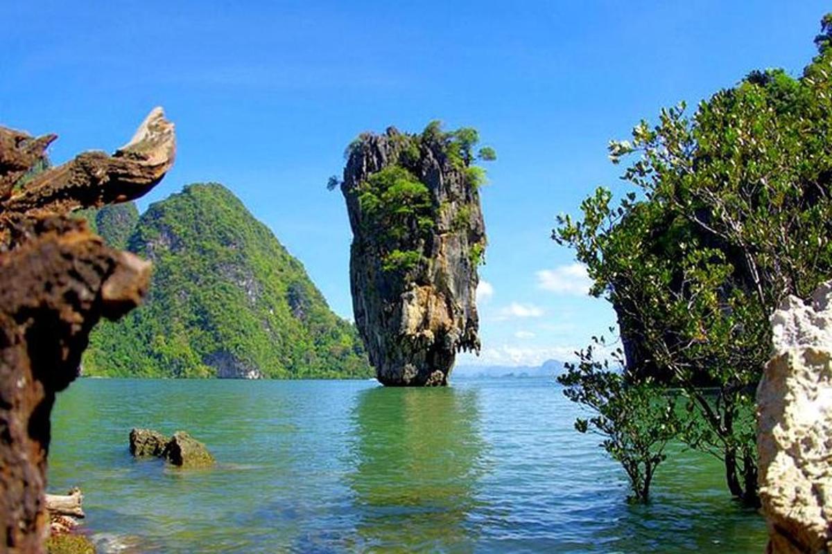 a view of a body of water with a rock formation