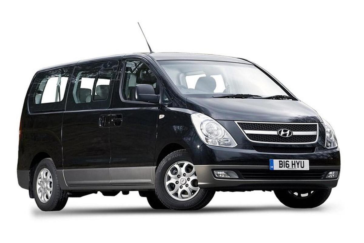 a black van is parked on a white background