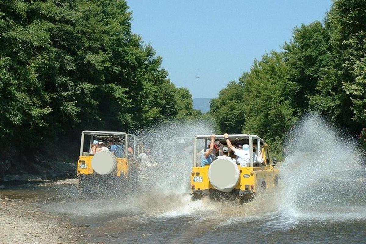 a group of people riding on a vehicle in the water