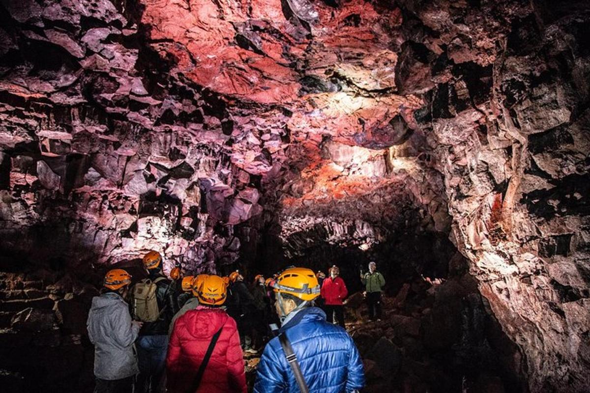 a group of people standing in a cave