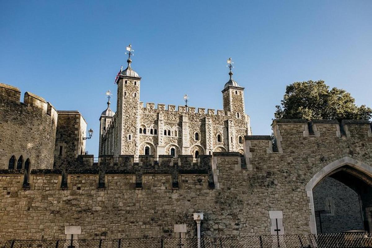 an old building with two towers on top of it