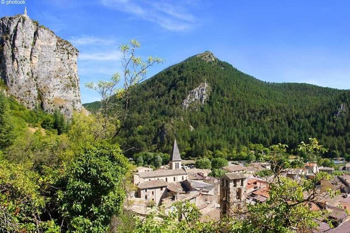 a small town in front of a mountain