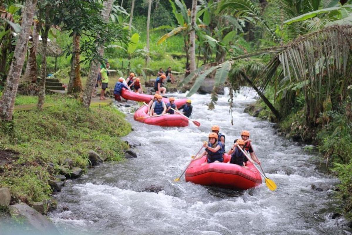 a group of people are rafting down a river
