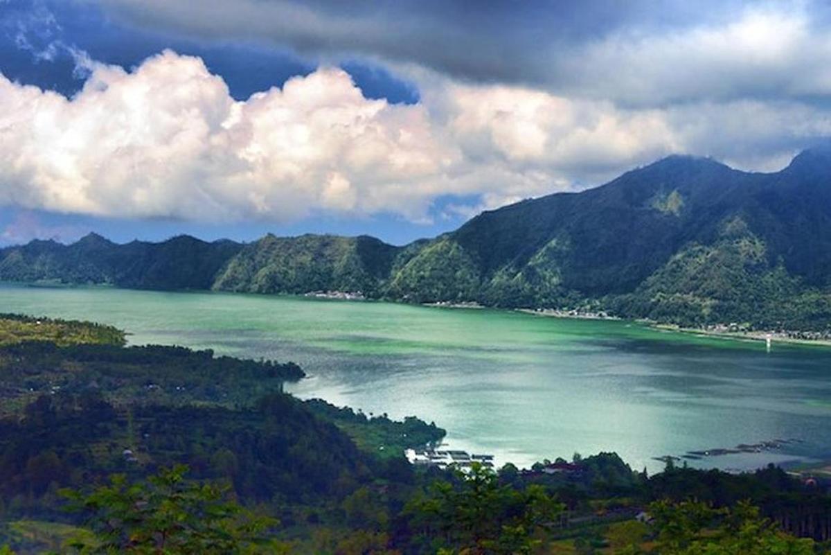 a view of a large body of water with mountains