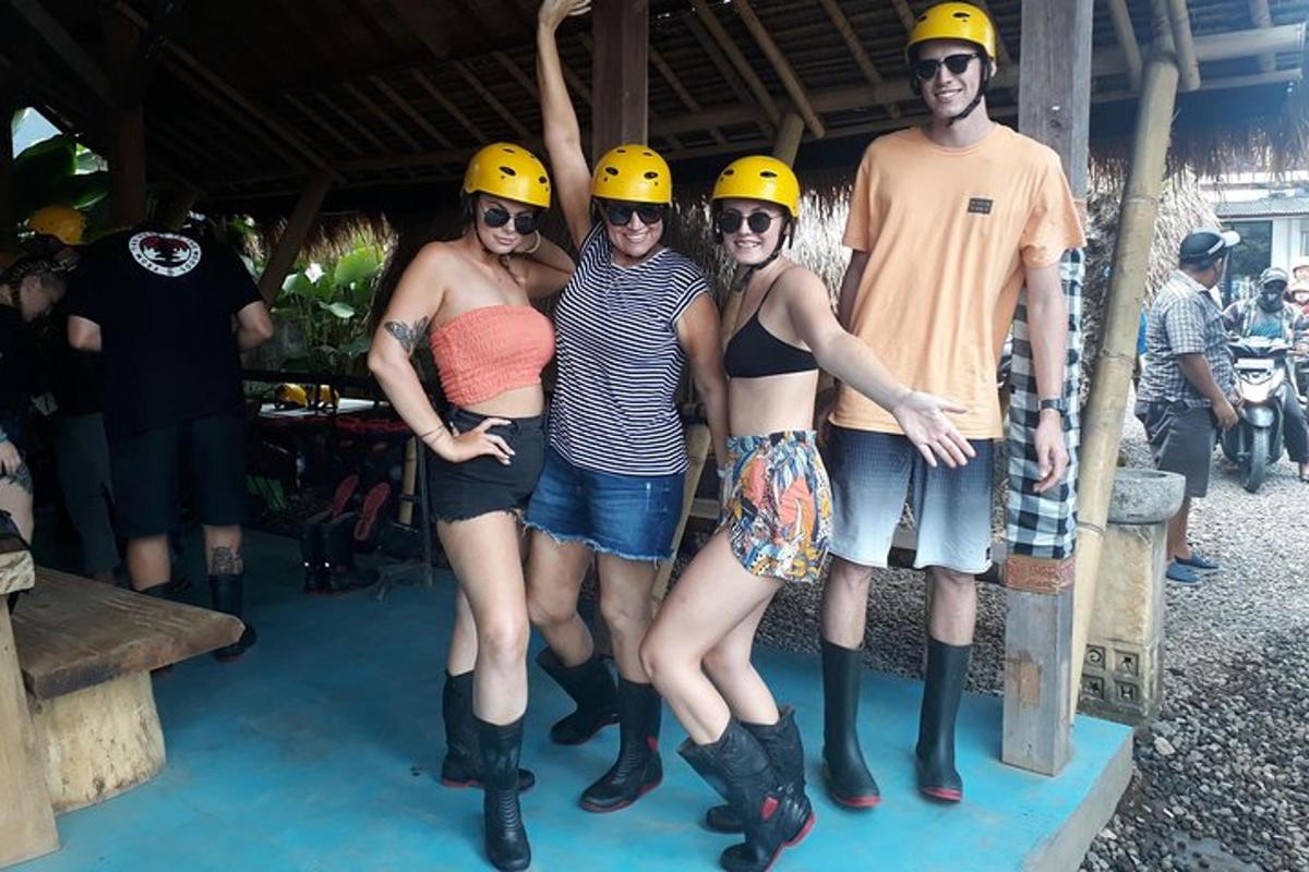 a group of people wearing helmets posing for a picture