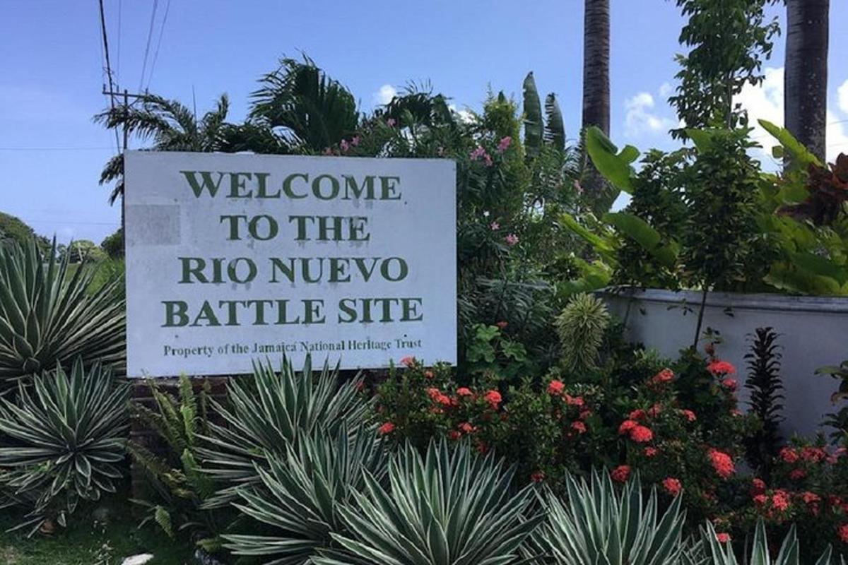 un cartello che dice benvenuti al sito della battaglia di No Nucongo