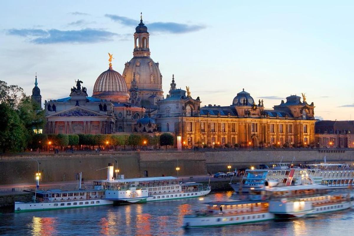 a large building with several boats in the water