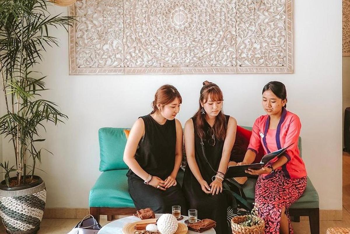 three women sitting on a couch in a living room