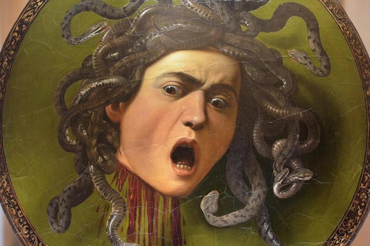 a painting of a woman with snakes on her head