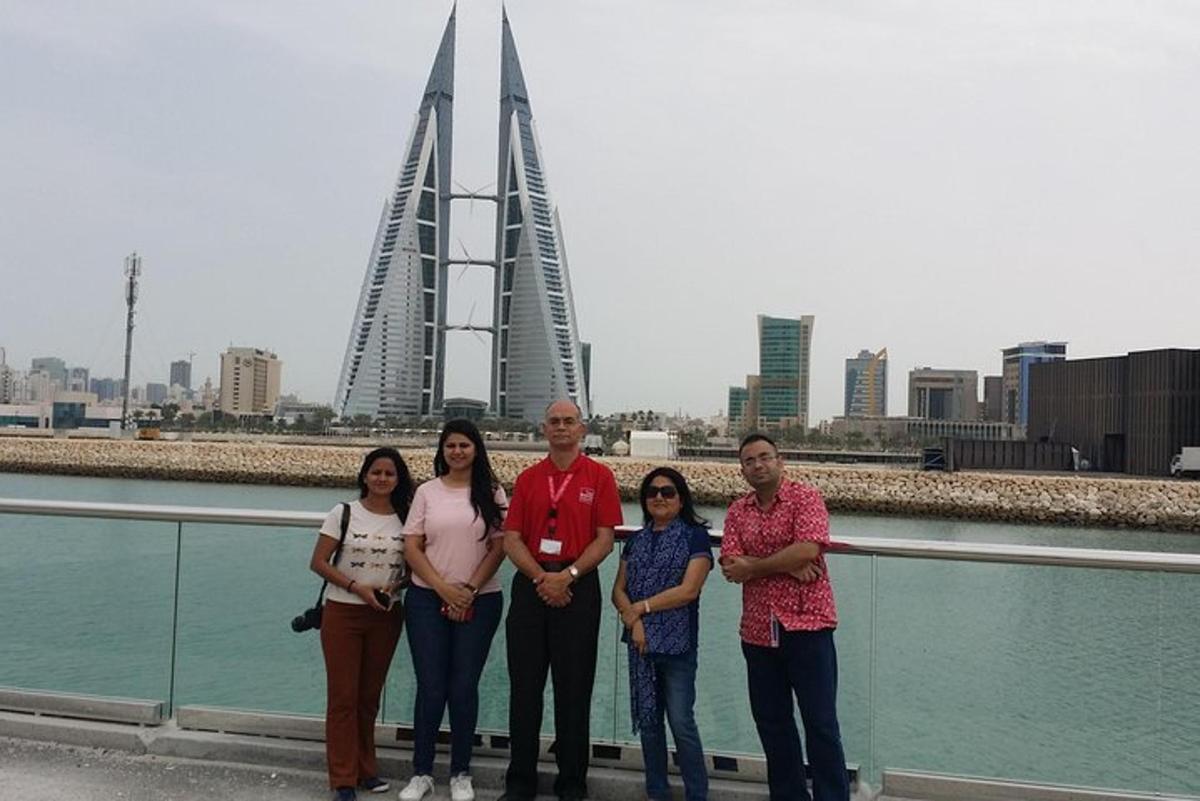a group of people standing in front of a river