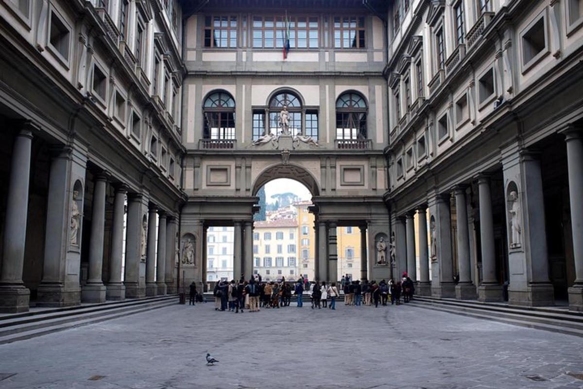 a group of people standing in a large building