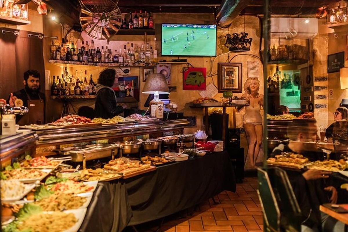 skupina lidí stojících kolem bufetu v restauraci