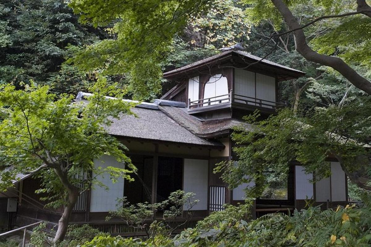 a house with a balcony on top of it