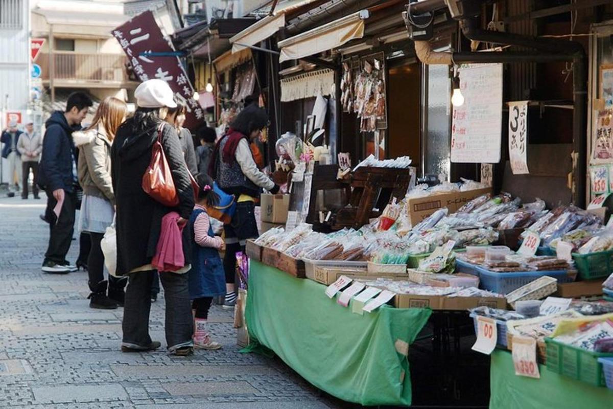 a group of people standing in front of a market