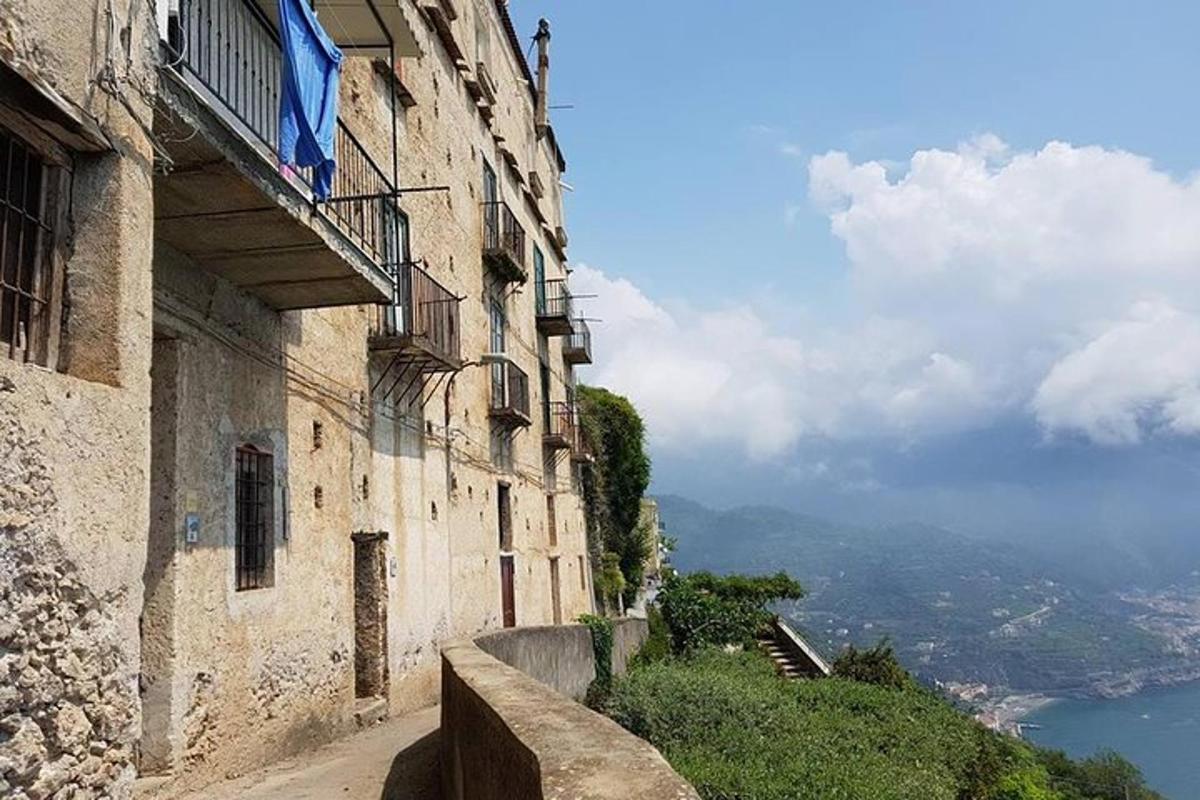 a building on the side of a hill with a view