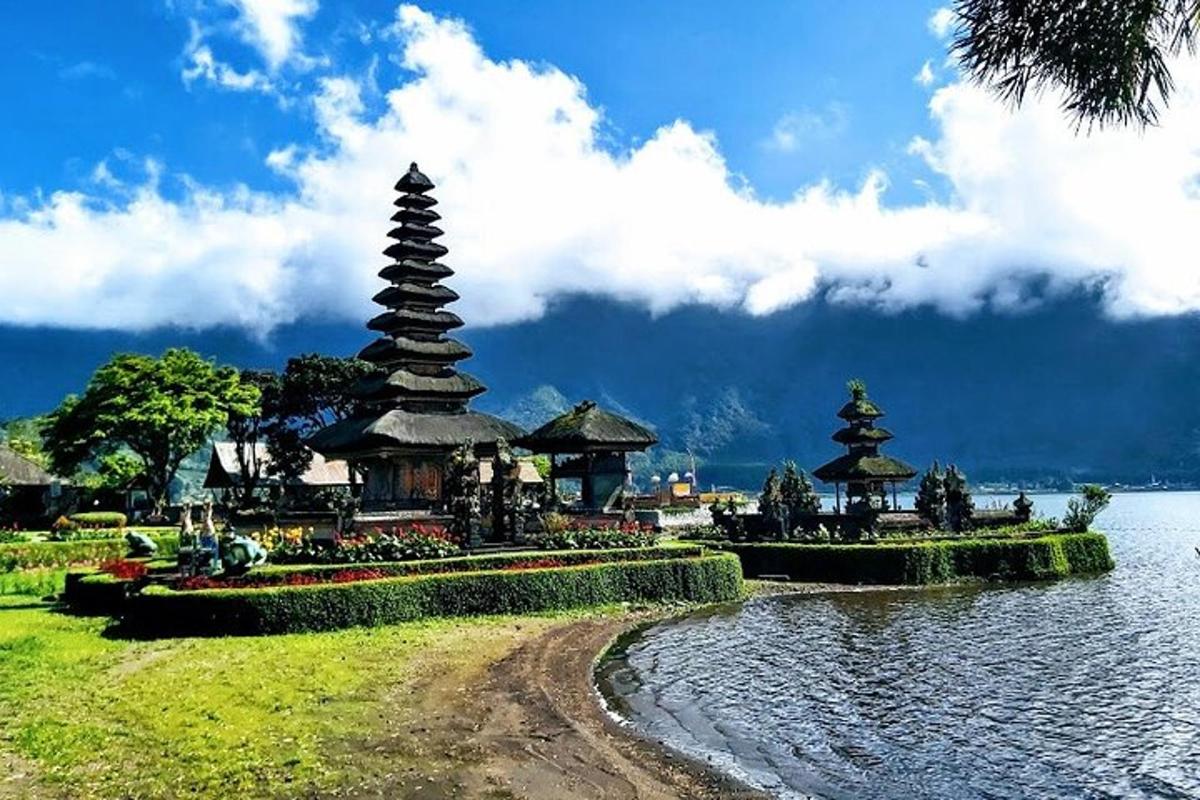 a group of pagodas in the middle of a lake