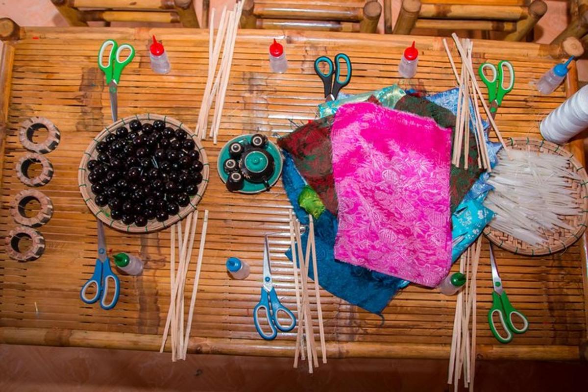 a wooden table with scissors and other items on it