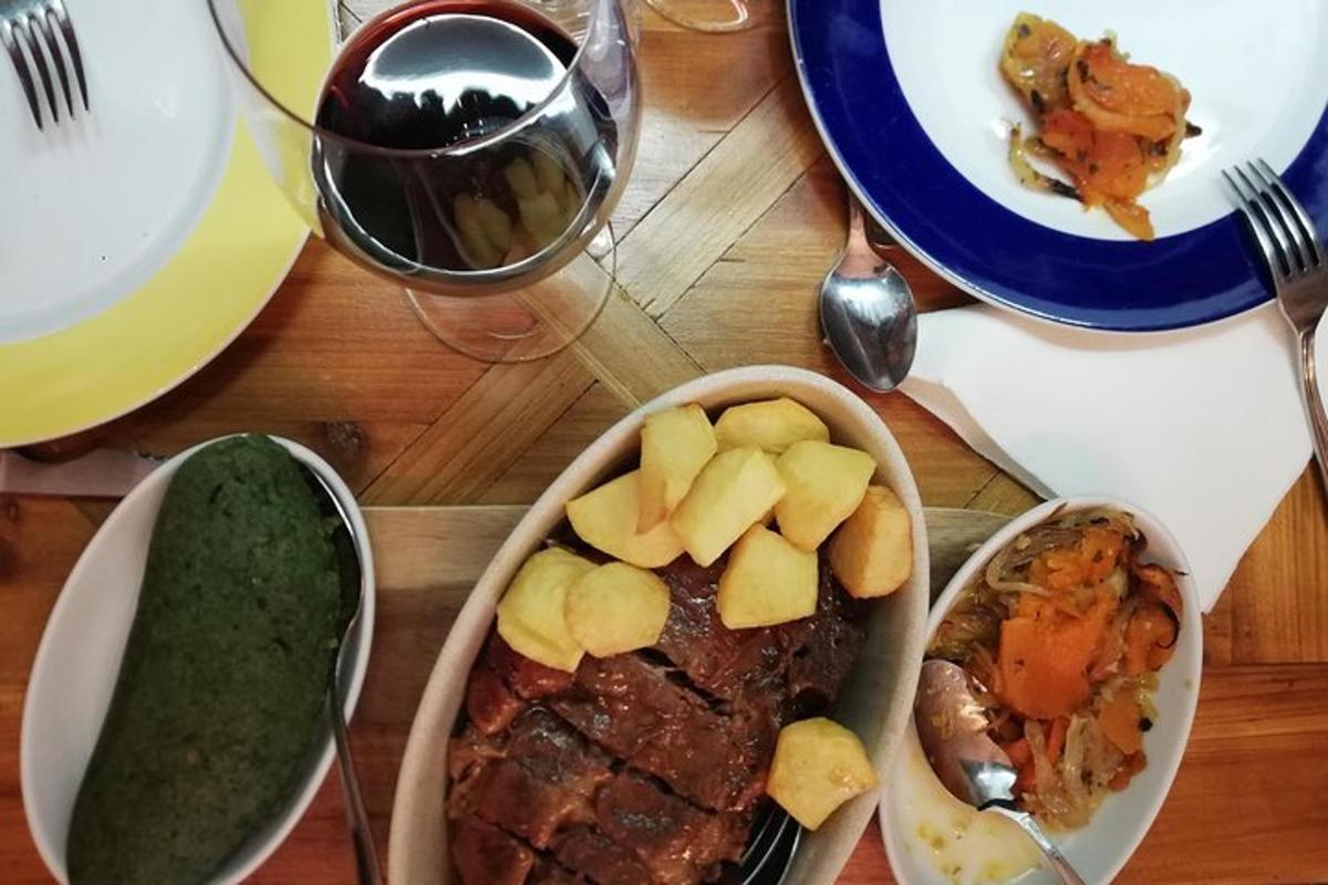 a table with a plate of food with meat and vegetables