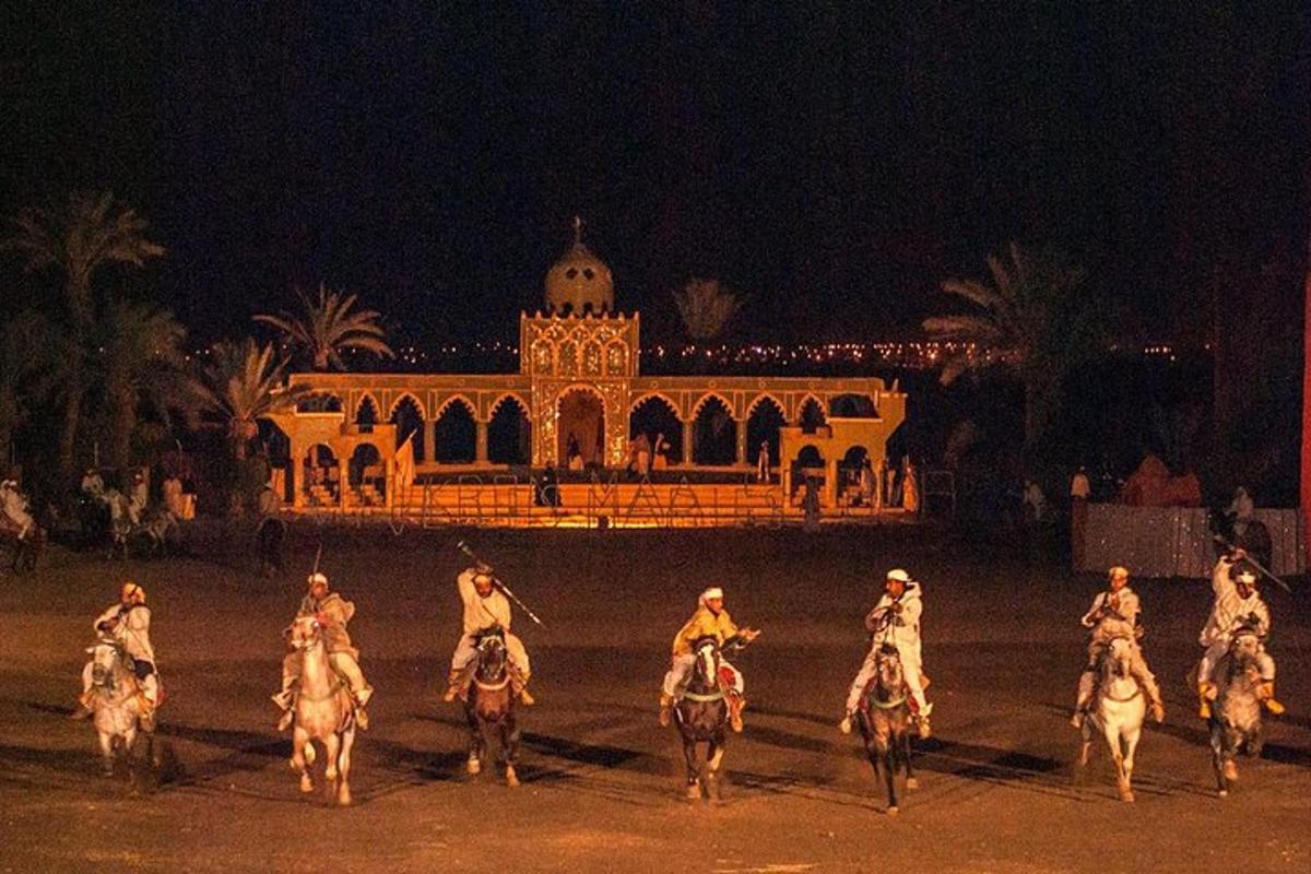 a group of people riding horses in front of a building