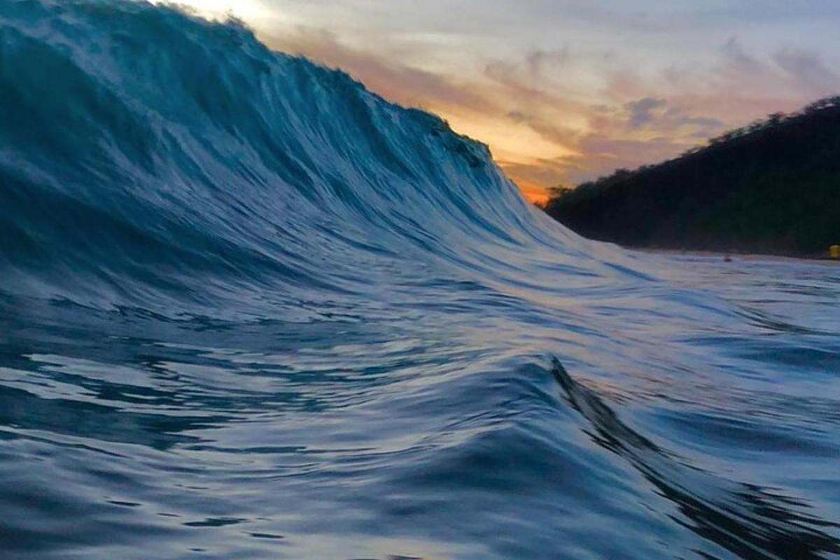 a painting of a large wave in the ocean