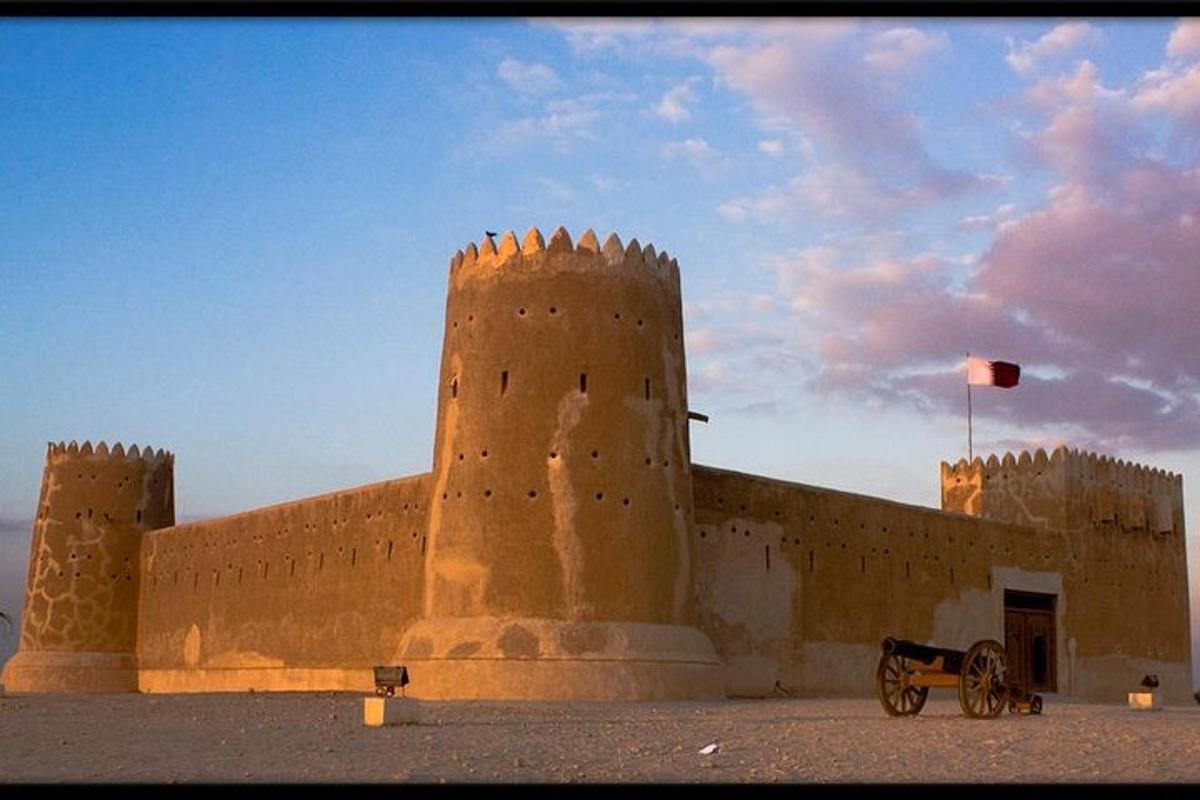 a castle with a horse drawn carriage in front of it