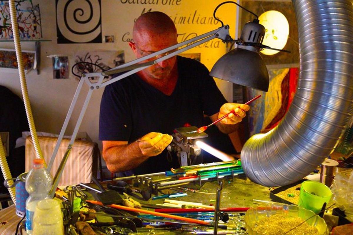 a man working on a piece of equipment on a table
