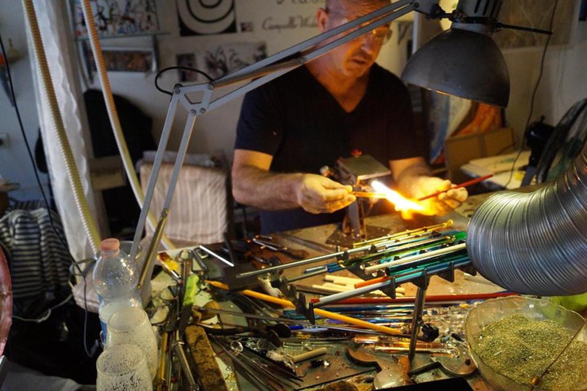 a man working on a machine in a shop