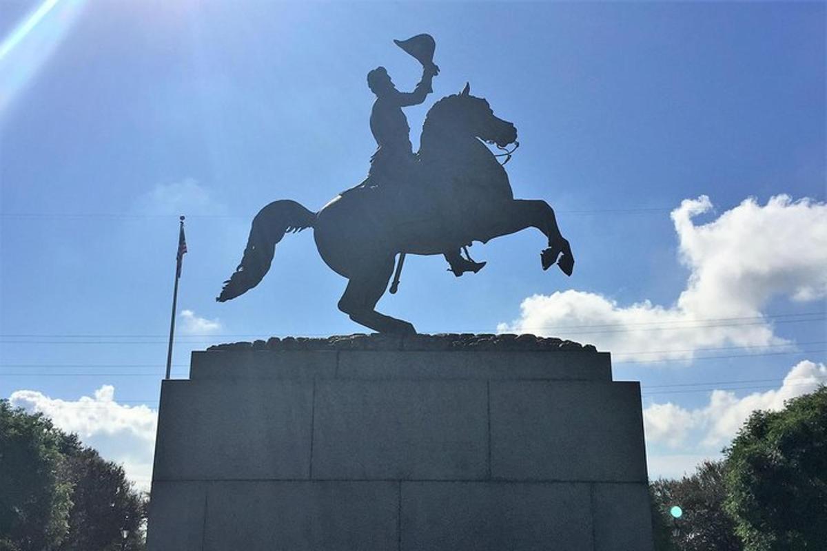 a statue of a man riding a horse