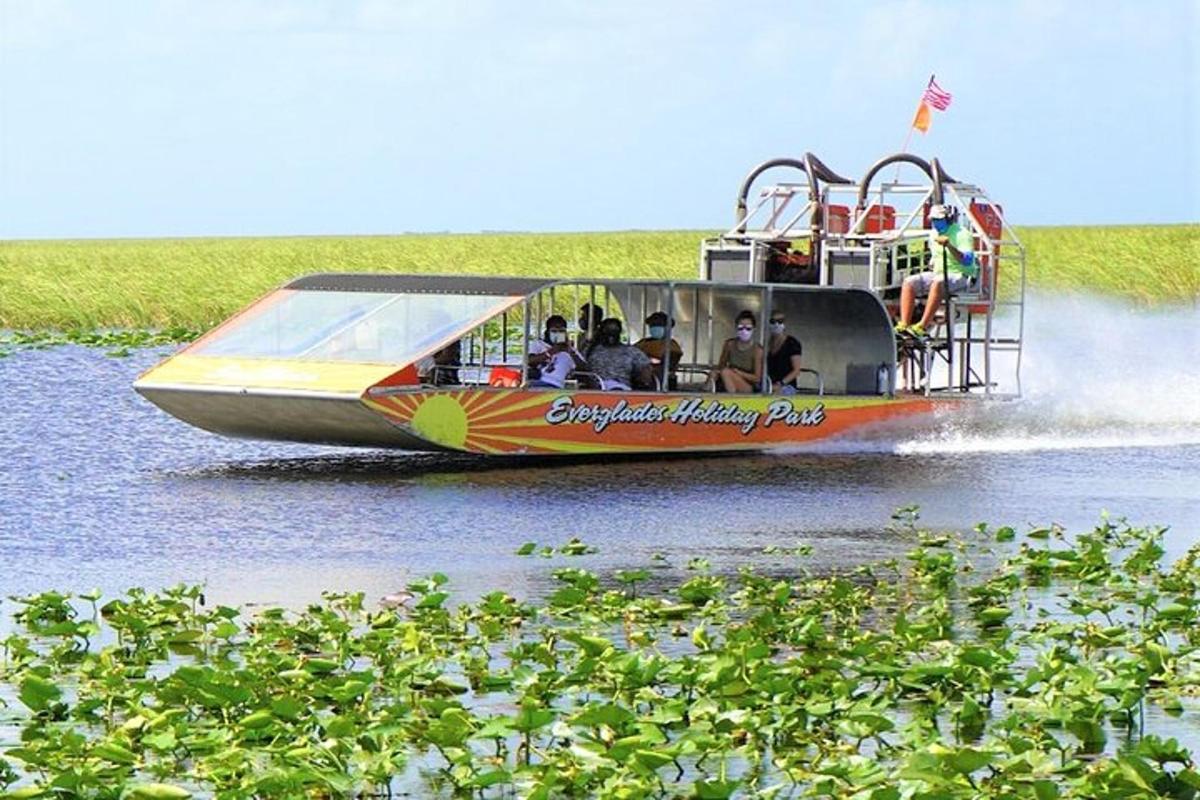 a boat on the water with people on it