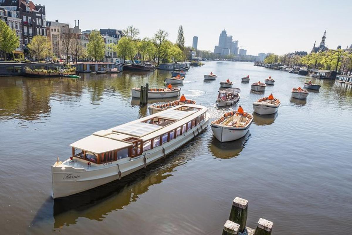a group of boats are docked in a river