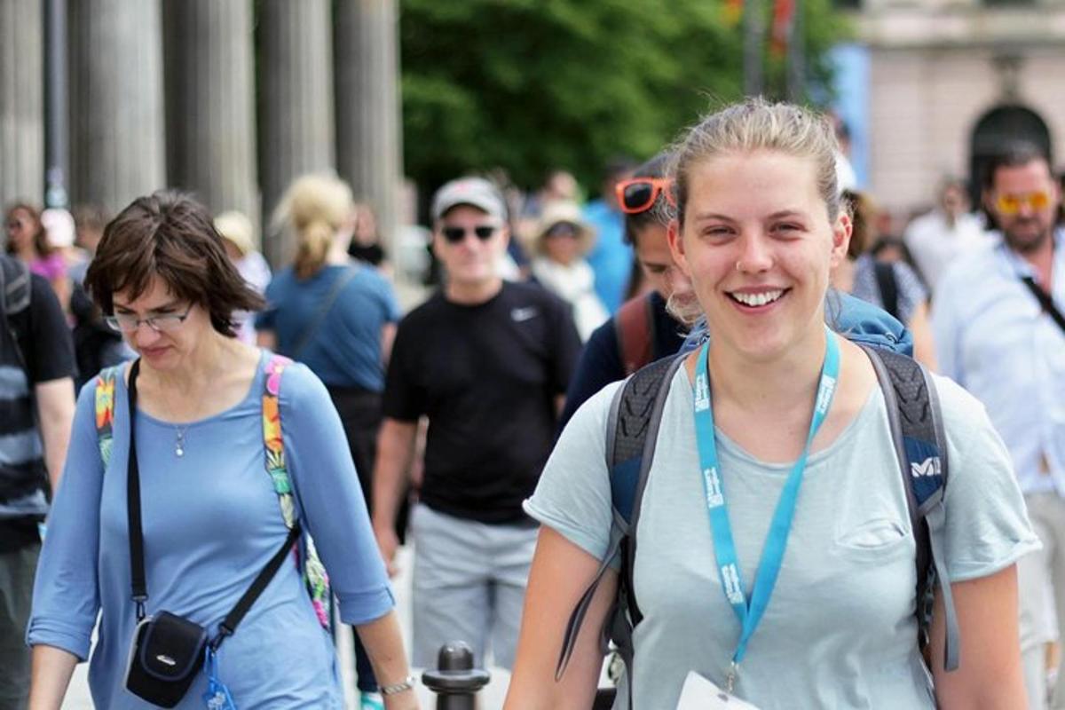 a group of people walking down the street