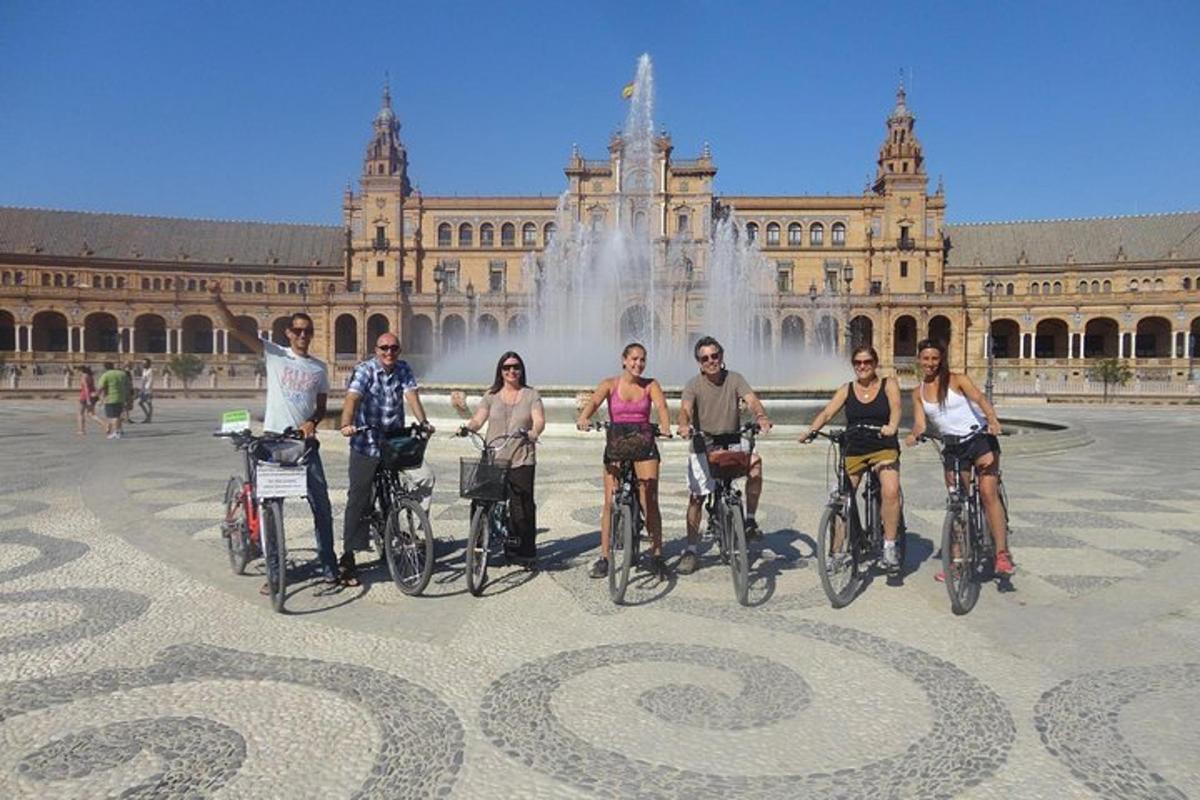 a group of people on bikes in front of a building