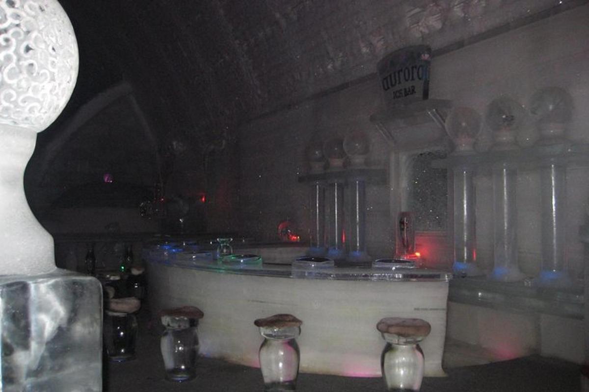 a kitchen with a counter with four glass jars