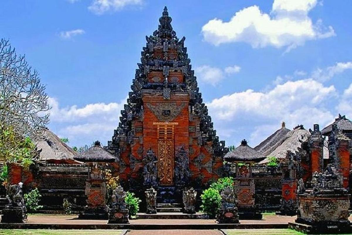 a building with a large tower in front of it