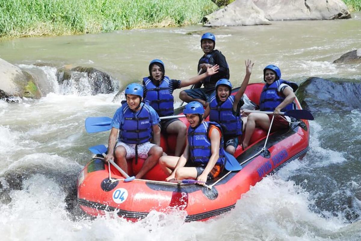 a group of people on a raft in a river
